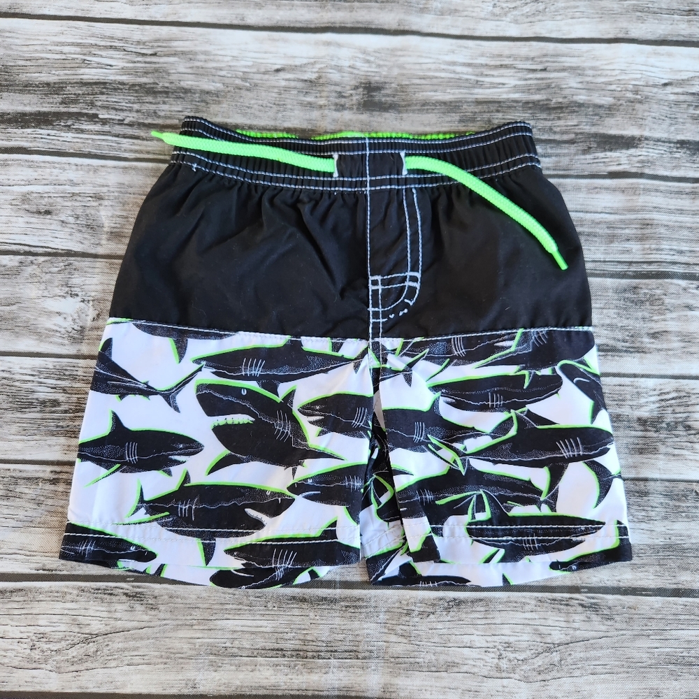 Old Navy black and neon green shark swim trunks